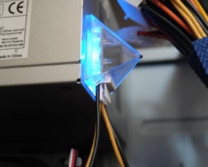 Blue illuminated Pyramid V+ device installed in hardware.