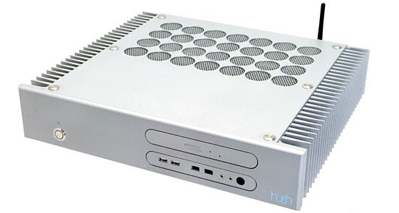 Silver Hush E2-MCE Silent Media Center PC with a large heatsink top cover, front USB ports, and optical drive slot.
