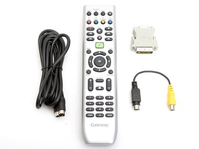 Accessories for Hush E2-MCE Silent Media Center PC including a remote control, cables, and adapters displayed on a white background.