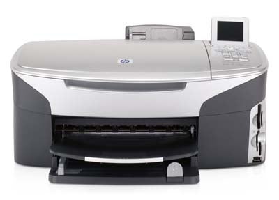 HP Photosmart 2610 multi-function printer with scanner, copier, and fax capabilities, featuring a color LCD display and memory card slots.