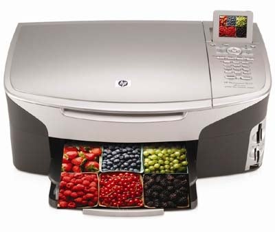 HP Photosmart 2610 Multi-Function Printer with sample color printout showing a grid of vibrant fruit images.