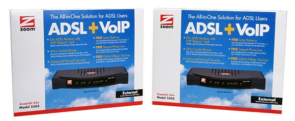 Two Zoom ZoomTel X5v Model 5565 - VoIP ADSL Router boxes side by side with product features highlighted on the packaging.