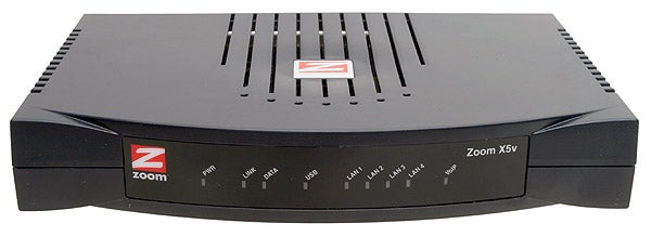 Front view of the Zoom ZoomTel X5v 5565 VoIP ADSL Router showing indicator lights and branding.