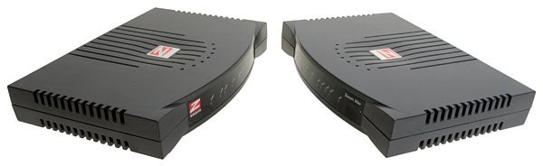 Two Zoom ZoomTel X5v 5565 - VoIP ADSL Routers displayed from different angles showing the front and side profiles.