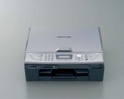 Brother MFC-410CN multifunction printer on a plain background, featuring fax, scan, and copy functions with an input paper tray extended.