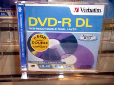 A Verbatim DVD-R DL package advertising double capacity with 8.5 GB displayed on a shelf, possibly for use with the NEC ND-3520A DVD writer.