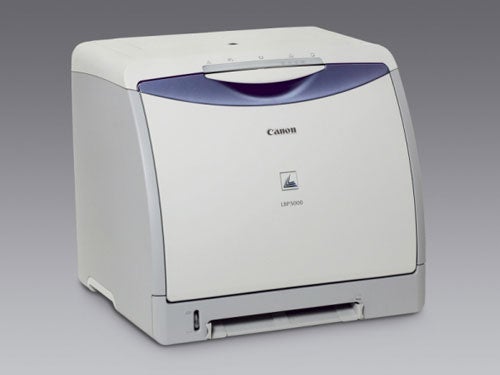 A Canon printer on a plain background, unrelated to the Rock Xtreme Ti Gaming Notebook product review.