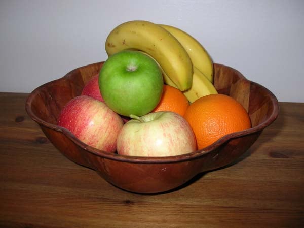 Vibrant fruit bowl with various fresh fruits including bananas, apples, and oranges, captured with the Nikon CoolPix 4800 showcasing color accuracy and detail.