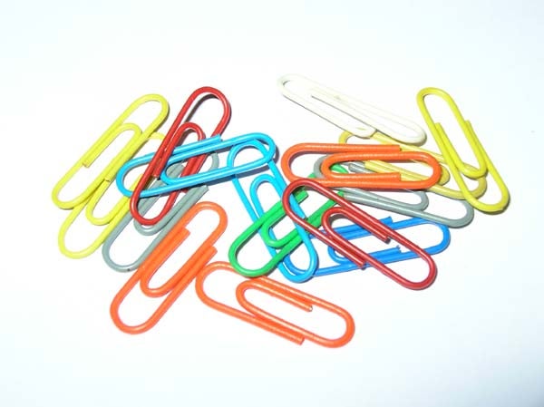 A collection of colorful paper clips arranged randomly on a white background, possibly demonstrating the color capture and clarity of the Nikon CoolPix 4800 camera.