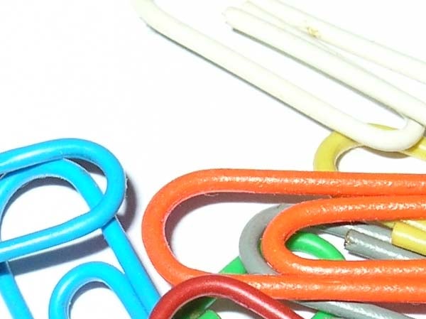 Close-up photo of colorful paper clips taken with a Nikon CoolPix 4800 camera, demonstrating the camera's macro photography capabilities.