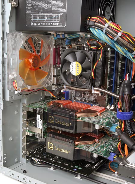 Interior view of Evesham Duel SLi Gaming PC showing the arrangement of components, including graphics cards in SLi configuration, cooling fans, and neatly organized cables.