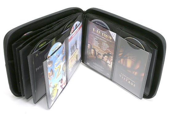 Slappa Optical Disc Storage case open showing various DVD and game discs in protective sleeves.