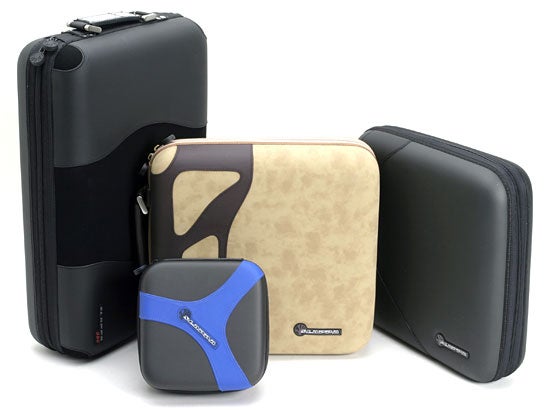 A variety of Slappa Optical Disc Storage cases in different sizes and colors including black, beige, and blue, displayed against a white background.