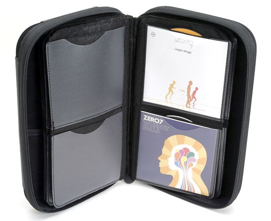 Open Slappa Optical Disc Storage case displaying CD pockets with CD album covers.
