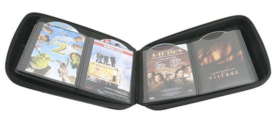 Open Slappa Optical Disc Storage case displaying various DVD movies in protective sleeves.