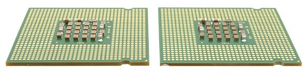 Two Intel Pentium 4 processors showcasing the underside view with the arrangement of contact pins.