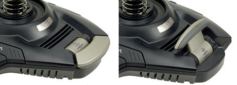 Close-up of the Saitek Cyborg Evo Force joystick showing the button layout and stick pivot detail.
