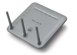 Belkin Wireless Pre-N Router with three antennas and status indicator lights on a white background.