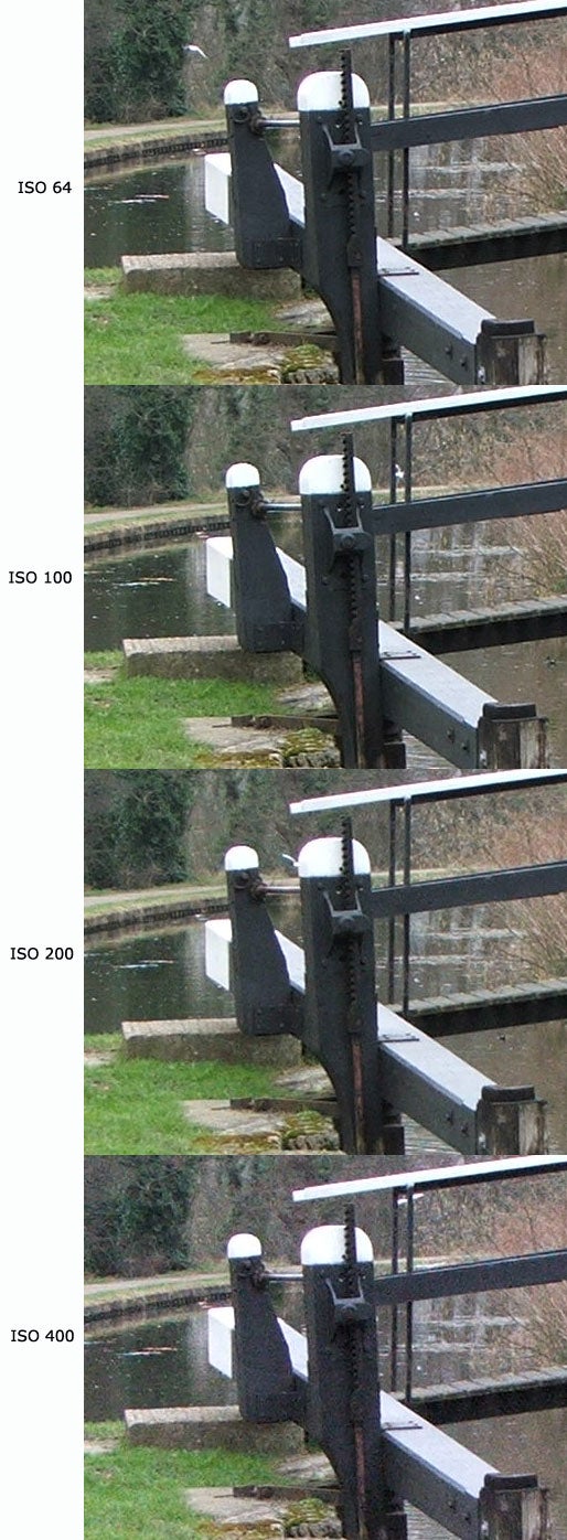 Series of four photos demonstrating different ISO settings on the Fujifilm FinePix S5500 camera, showing a lock gate with increasing levels of noise from ISO 64 to ISO 400.