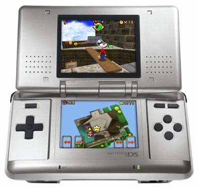 Silver Nintendo DS Handheld Console open and displaying a game with Mario on the upper screen and game interface on the lower screen.
