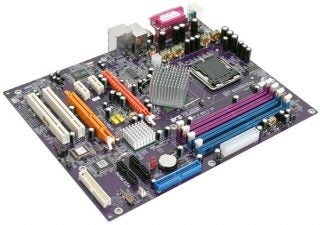 ECS 915P-A (1.2A) motherboard featuring various ports, slots, and a CPU socket with an installed heatsink, displayed on a neutral background.