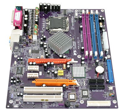Overhead view of ECS 915P-A (1.2A) motherboard featuring various connectors, expansion slots, and a central processing unit (CPU) socket with a passive heatsink.