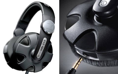 Close-up of Sennheiser HD 215 headphones showing detail of the ear cup, adjustment mechanism, and audio cable.