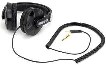 Sennheiser HD 215 headphones with coiled cable and 3.5mm to 6.3mm gold-plated adapter.