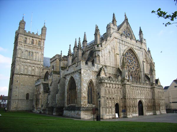 Photograph taken by the Ricoh Caplio R1V digital camera, showcasing the detailed architecture of an elaborate Gothic cathedral against a clear blue sky.