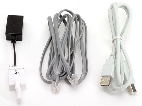 Product accessories for the Actiontec Internet Phone Wizard, including a power adapter and cables.