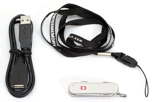 Swissbit Victorinox retroALOX USB flash drive with silver Alox design, paired with a black neck lanyard and a separate USB cable against a white background.