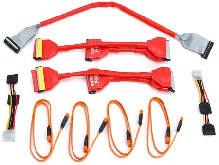 Collection of red and orange computer cables and connectors included with the MSI P4N Diamond Pentium SLI Motherboard.