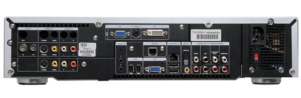 Rear view of Hi-Grade DMS II Media Center PC showing various input and output ports including USB, Ethernet, audio, and video connections.