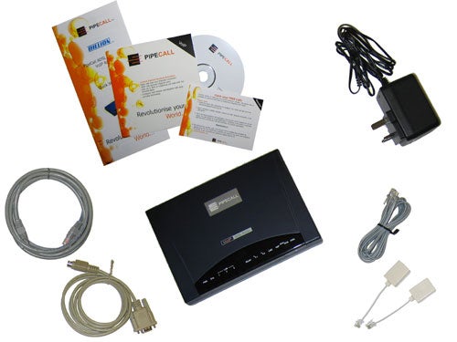PipeCall ADSL Integrated Router with accessories including cables, power adapter, installation CD, and instruction manual.