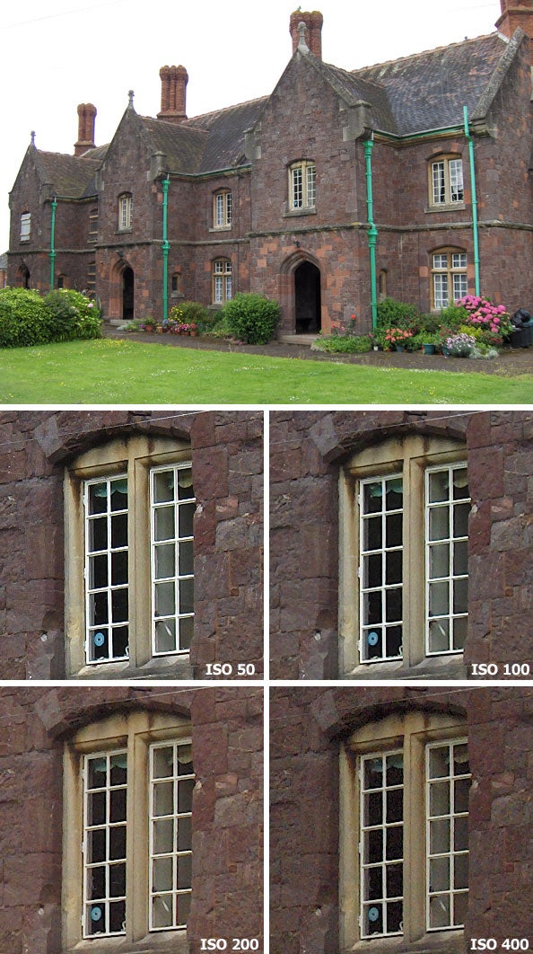 Composite image showing a comparison of photo quality at different ISO settings using the HP Photosmart R717 digital camera, featuring an exterior shot of a historical building and close-ups of a window at ISO 50, 100, 200, and 400.