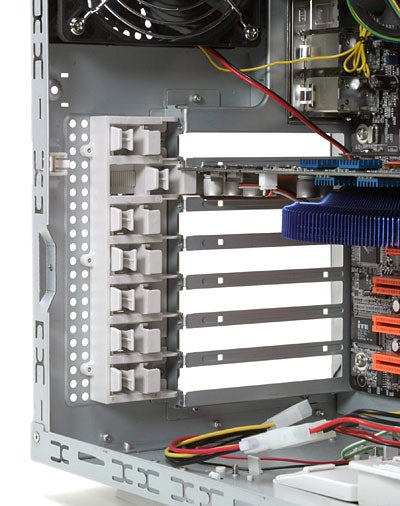 Interior view of a SilverStone Temjin TJ05 computer case showing drive bays and motherboard installation.