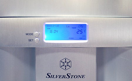 Close-up of the SilverStone Temjin TJ05 computer case's front panel displaying the built-in temperature readout with CPU temperature at 25 degrees Celsius.