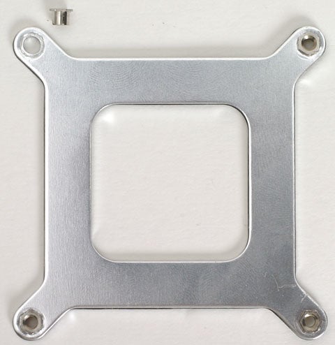 Close-up of a metallic square-shaped bracket related to the AOpen i915GMm-HFS Pentium M motherboard.