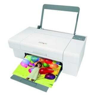 Lexmark Z735 color inkjet printer with a vibrant, full-color printed photo featuring balloons and a person emerging from the output tray.