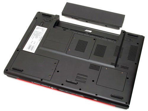 Underside of the Acer Ferrari 4000 Notebook showing battery, vents, and panels against a white background.
