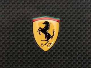 Close-up of the Ferrari logo on the textured surface of the Acer Ferrari 4000 Notebook.