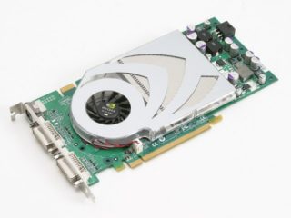 nVidia GeForce 7800 GT reference graphics card lying on a white surface, showcasing its cooler design and output ports.