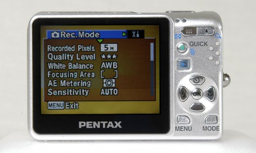 Rear view of the Pentax Optio S5z camera showing its LCD screen with the settings menu visible and camera controls on the right side.