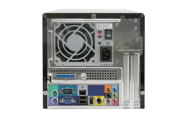 Rear view of AOpen XC Cube EZ482 SFF Barebone system showing the back panel with various ports including USB, Ethernet, and audio jacks, next to the power supply and expansion slots.