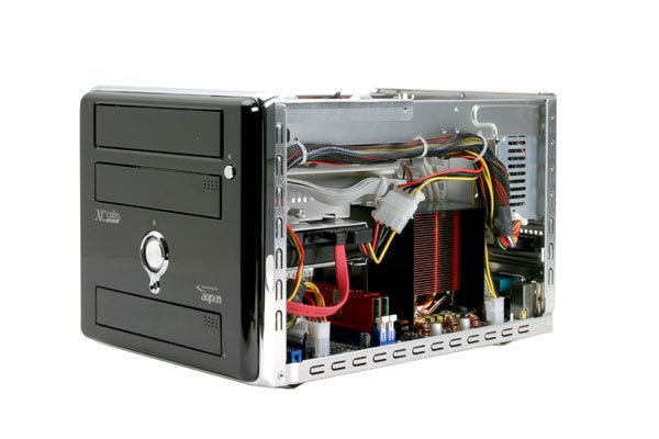 AOpen XC Cube EZ482 SFF Barebone system with open side panel showing internal components like motherboard, wiring, and drive bays.