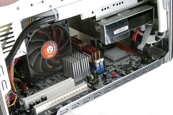 Interior view of the AOpen XC Cube EZ482 - SFF Barebone showing the motherboard, expansion slots, and cooling fan.