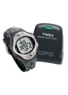 Timex Bodylink System watch with a digital display showing heart rate and running time, alongside the GPS Data Recorder with the 'SPEED+DISTANCE' label.