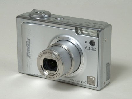 Fujifilm FinePix F10 digital camera with lens extended, showcasing the 6.3 megapixel resolution marking and branding, displayed against a neutral background.
