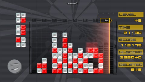 Screenshot of Lumines game interface showing a pattern of red and white blocks within the gameplay grid, indicative of an ongoing game session, with stats displayed including level, time, score, high score, and number of blocks deleted.