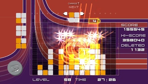 Screenshot of the puzzle game Lumines showing gameplay with blocks being cleared and the current score, level, and time displayed on screen.